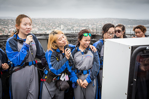 Chinese group singing for Karaoke on the Sydney Harbour Bridge.jpg.jpg,0