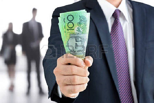 44492375-businessman-hand-holding-money-australian-dollar-aud-banknotes.jpg,0