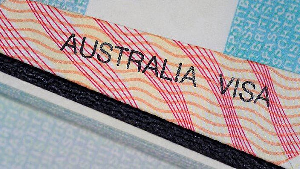 australian_visa_in_between_two_british_passport_pages_getty_imgaes.jpg,0