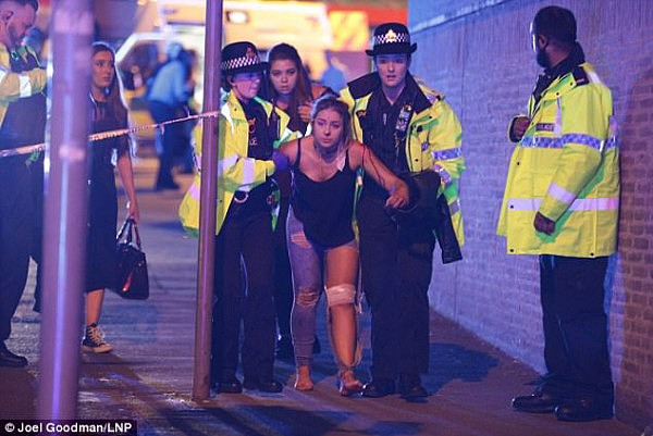 40AE2C7E00000578-0-Bloodied_concertgoers_were_pictured_being_helped_by_armed_police-a-29_1495497554826.jpg,0