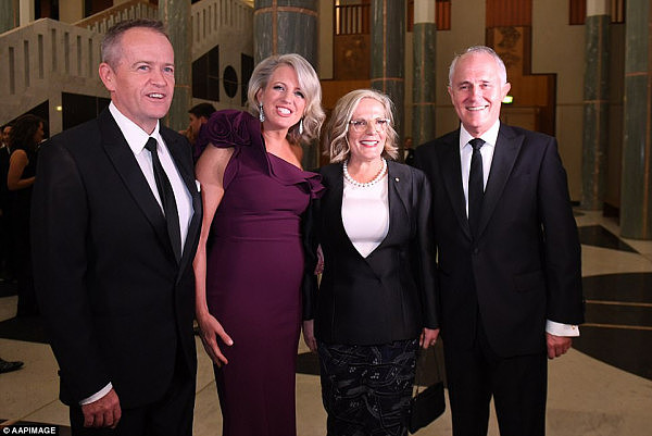 Bill Shorten and his wife Chloe posed with Malcolm Turnbull and his wife Lucy at the Mid Winter Ball on Wednesday