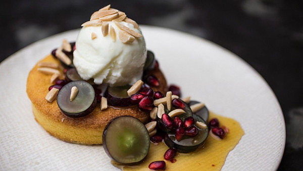 Middle Eastern vibe: The flourless orange and almond cake with grapes, pomegranate and yoghurt sorbet.