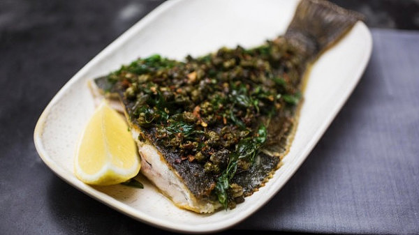 Whole yellow belly flounder with caper, garlic and chilli crust.