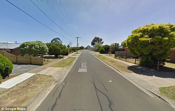 A boy believed to be three-years-old was found at 2am wandering down Morris Street (pictured) in west Melbourne in his blue pajamas