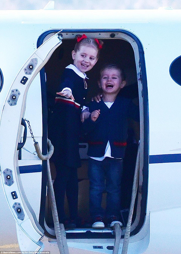 The disgraced banker's five-year-old daughter Pixie could be heard screaming 'Dada, Dada!' as he approached the Cooma airport tarmac