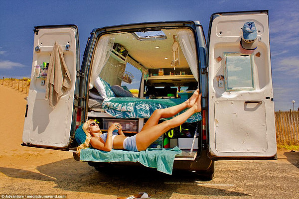Aaron Goodfellow, 27, from Southampton, England, and Sophie Taylor, 24, from Wamberal, Australia - who made headlines earlier this year after partying with Prince William in Switzerland - have converted a battered Ford Transit van into a home on four wheels