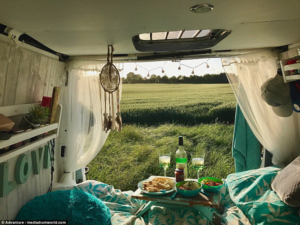 Sundown snack: To date, they have clocked up 2,000 miles on the road. Aaron and Sophie met in Switzerland before taking the plunge to travel around Europe in a van