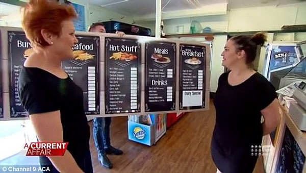 Pauline Hanson presents a glossy new menu to the Causeway Lake Kiosk with new addition