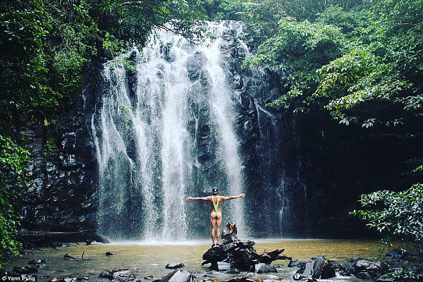 The 23-year-old visited several stunning locations across the country including this waterfall at Ellinjaa Falls, Queensland