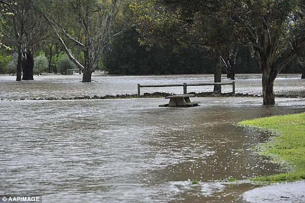 Showers and gusty winds were also likely to spread across much of NSW, Victoria, the ACT and Tasmania on Monday through until Wednesday (South Australian flooding pictured) 