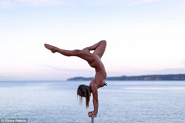 The Sydney native (pictured here at a nudist beach at sunrise) has accumulated 40,000 followers on Instagram thanks to the snaps of her incredible gymnastics moves 