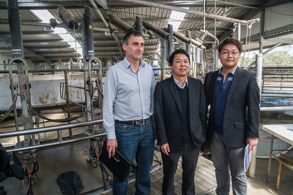 Former CEO of VDL Farms, David Beca, with Moon Lake chairman Lu Xianfeng and Moon Lake managing director Sean Shwe ...