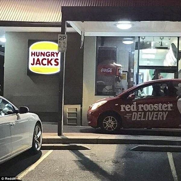 A Red Rooster delivery car was spotted in a Hungry Jack's drive-thru