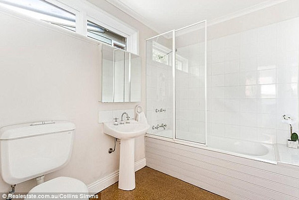 Despite a modern theme throughout the home, key rooms such as the bathroom (pictured) have uninspiring fittings and decor