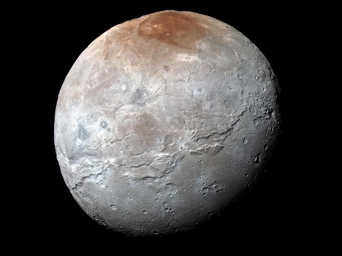 科学家发现冥王星最大卫星上的红帽的可能来源 - 1