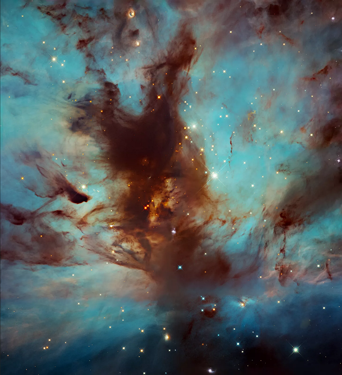令人惊叹：哈勃分享“火焰星云”最新的黑暗、尘土飞扬的心脏图 - 1