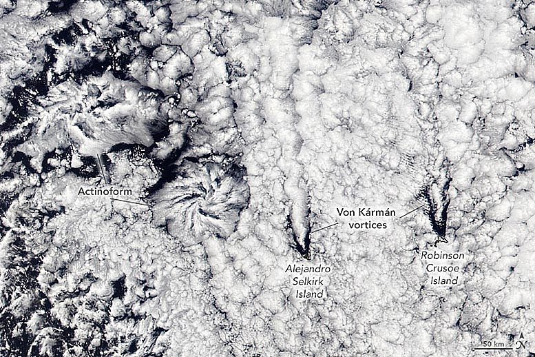 太平洋上的云聚会：花状放射形云和螺旋形冯卡曼漩涡云 - 1
