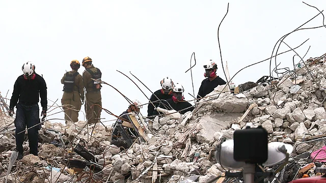 美国迈阿密大楼倒塌事故搜救行动已停止 重心转向恢复工作 - 1
