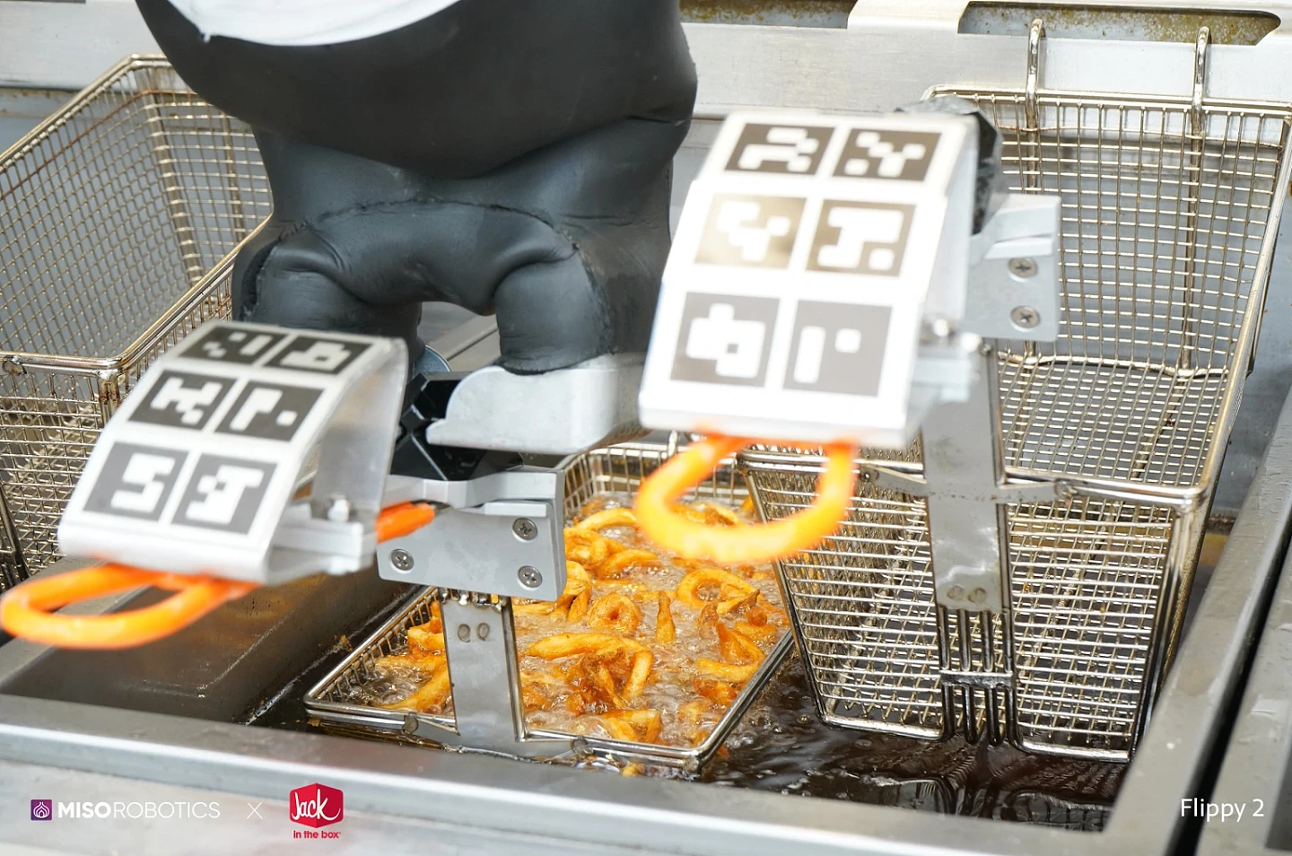 Miso-Robotics-Flippy-2-x-Jack-in-the-Box-Cooking-Curly-Fries.webp