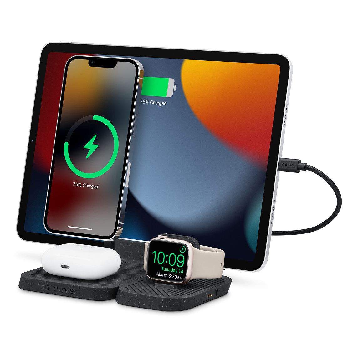 Angled view of the Zens 4-in-1 charger in black, charging iPad, iPhone, Airpods, and Apple Watch.