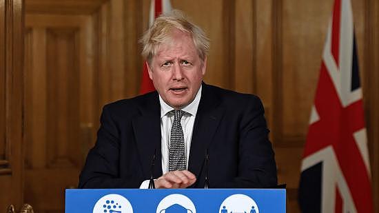 英国首相恢复居家工作建议 以遏制omicron传播 - 1