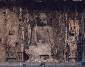 龙门石窟的佛像为什么脸都破坏了？是谁破坏的？ - 1