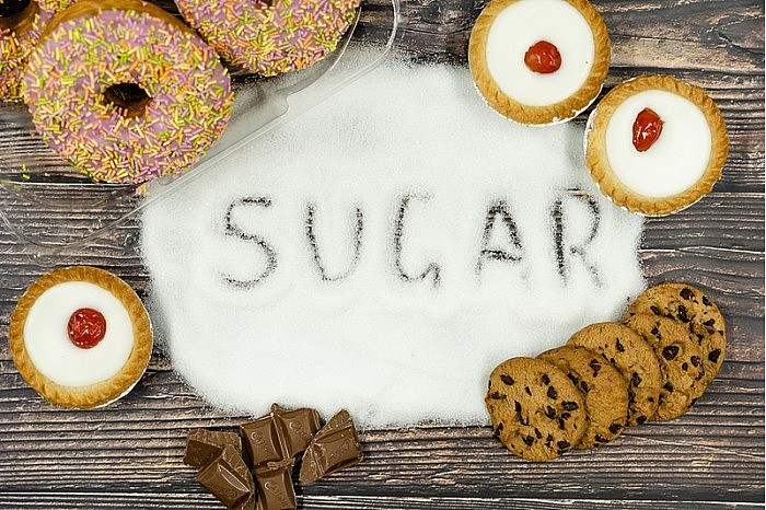 Sugar_in_Junk_Food_-_Doughnuts,_Biscuits,_Chocolate_and_Cake.jpg
