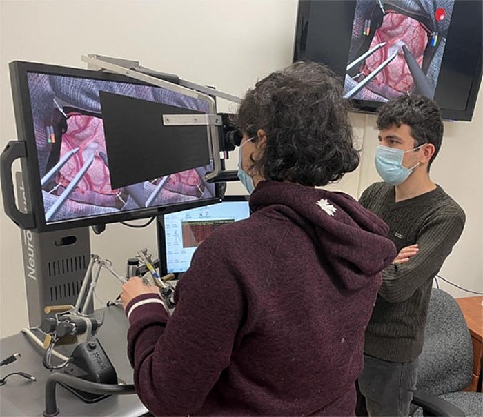 2Student-Training-on-Neurosurgical-Simulator.jpg