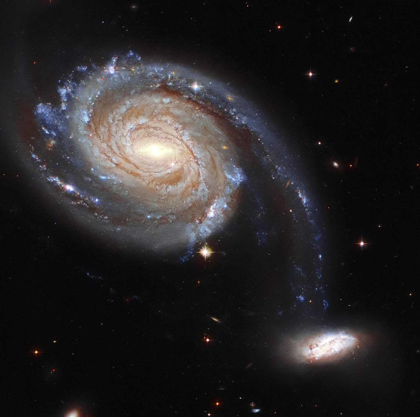 哈勃望远镜展示Arp 86：相互作用的奇特星系 - 1