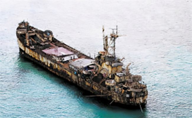 赖在仁爱礁22年的菲律宾海军：住着破船，靠发电机做饭，风吹日晒 - 1