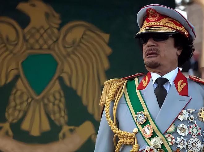 2008年普京携46亿欠条拜访卡扎菲，次日早餐，普京：这顿算45亿 - 2