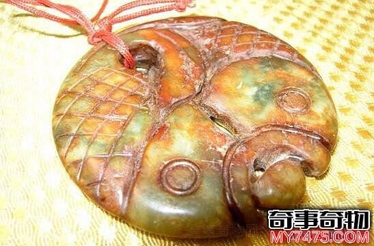 双鱼玉佩恐怖的图片 新疆罗布泊神秘双鱼玉佩