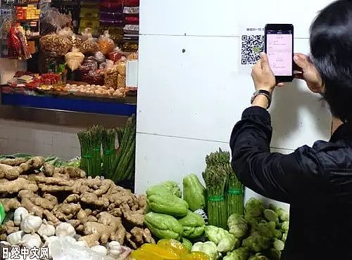 中国手机支付提升消费频率：不带现金花钱更多 - 1